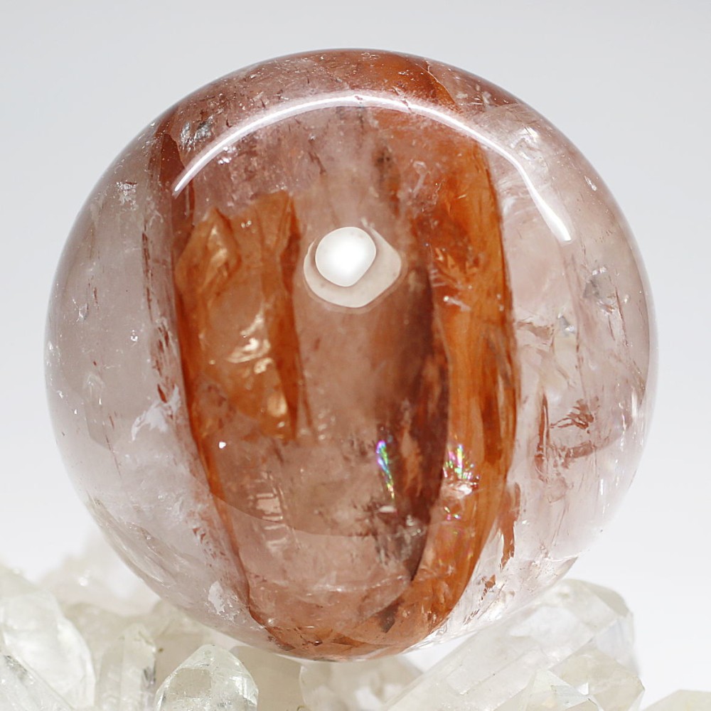 マニカラン産]ヒマラヤ水晶丸玉/スフィア（赤褐色・オレンジ系