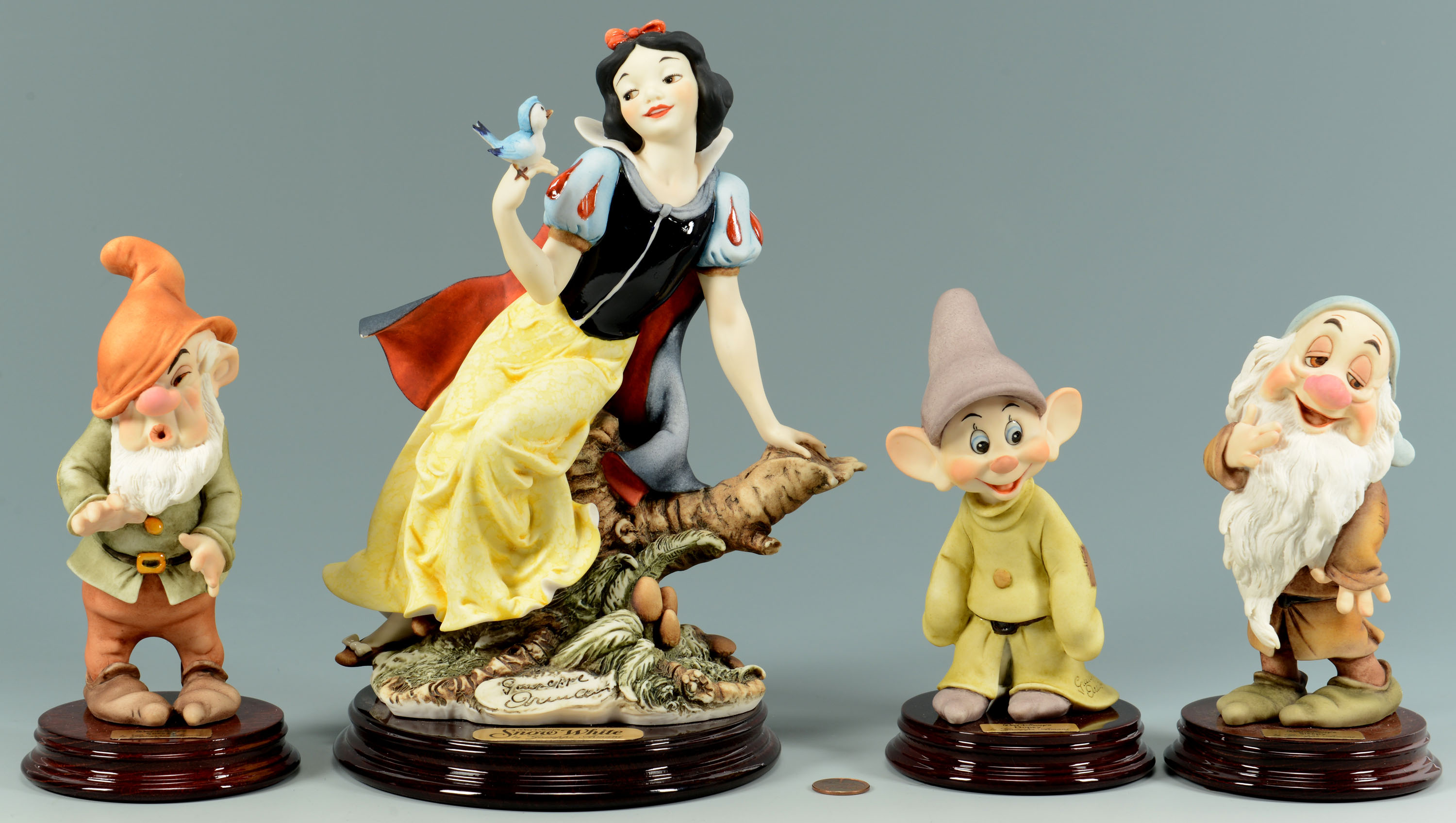 Lot 907: 4 Giuseppe Armani Snow White Figures | Case Auctions
