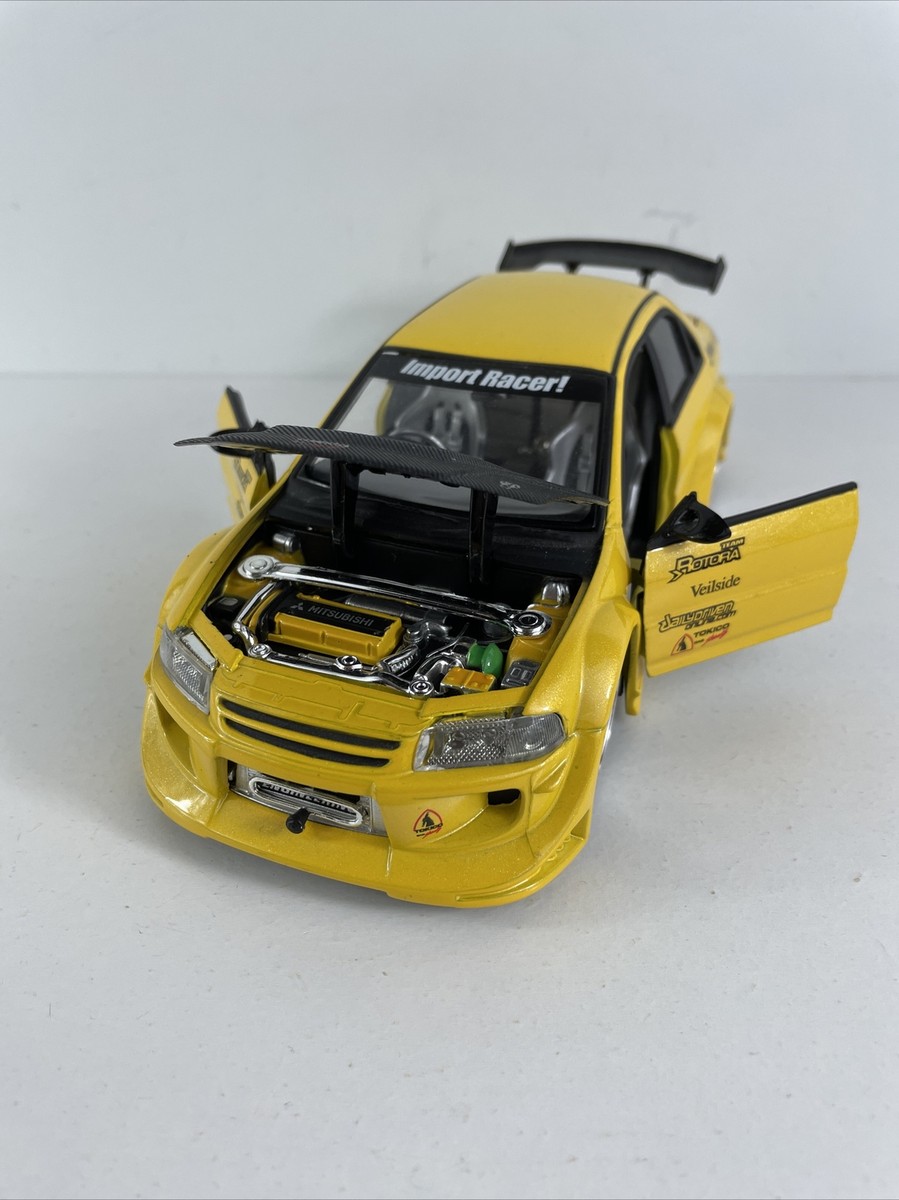Jada Toys Mitsubishi Lancer Evolution VI Yellow 1:24 Scale Hot