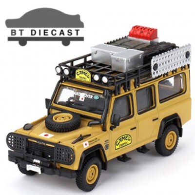 MINI GT LAND ROVER DEFENDER 110 1989 CAMEL TROPHY AMAZON TEAM