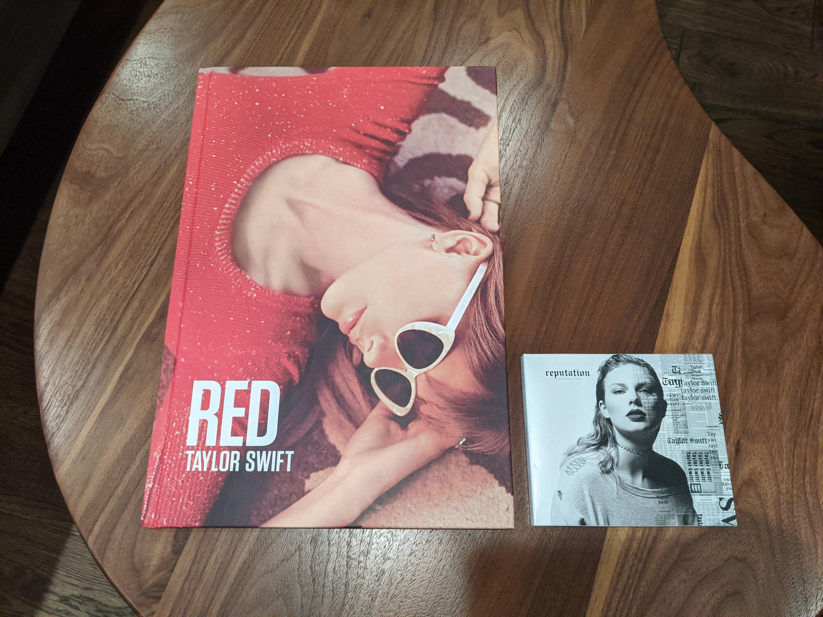 I never realized how large the RED Photo book is! : r/TaylorSwift
