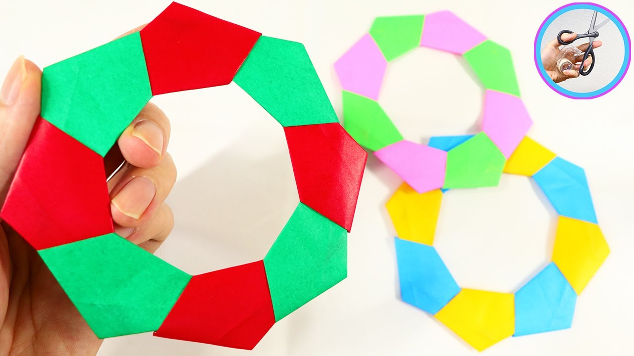 How to fold a wreath using 8 origami sheets. This origami wreath