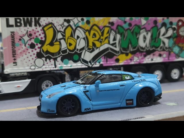 MINI GT LB-WORKS Nissan GT-R (R35) Light Blue Collection Garage
