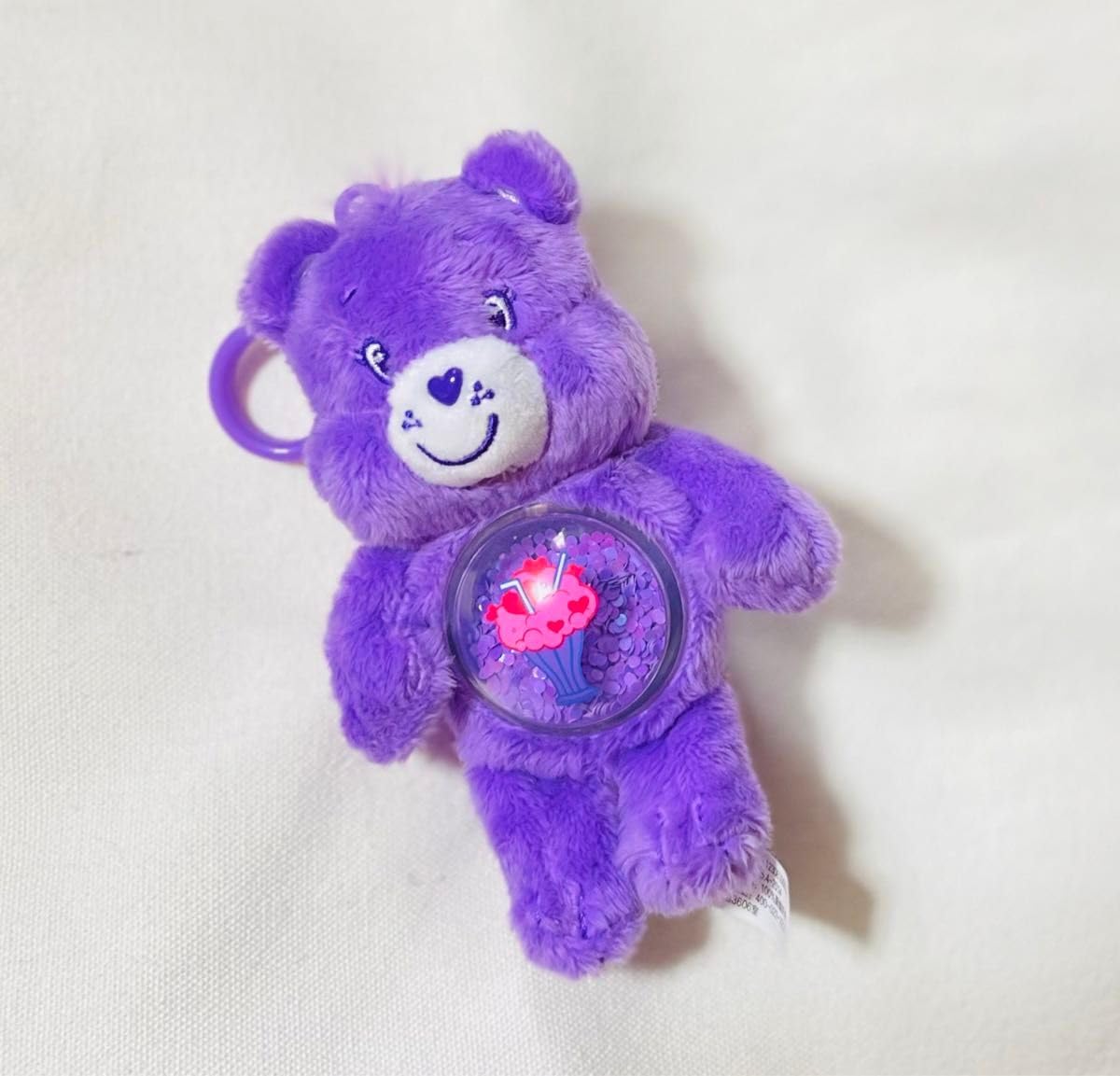 Amazon.co.jp: ケアベア ぬいぐるみキーホルダー 紫 : おもちゃ