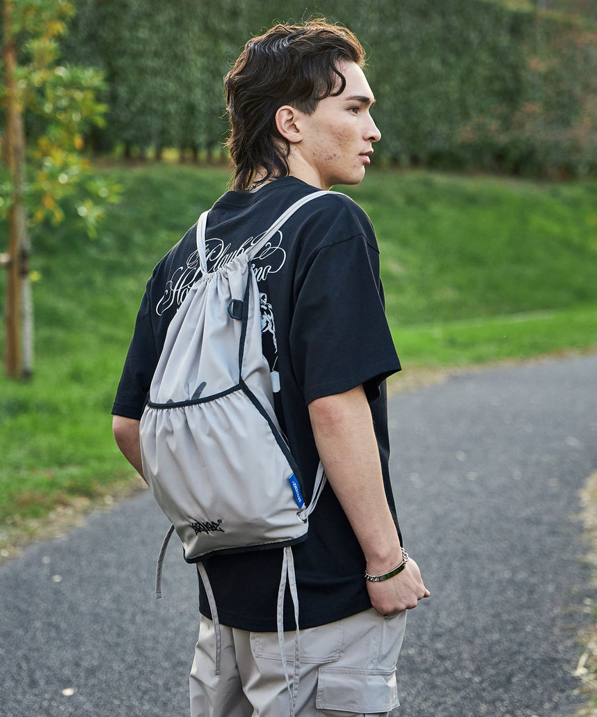 SEQUENZ 2 FACE STRING KNAPSACK / リバーシブル テック ナップサック