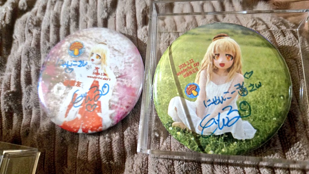 10周年特別企画の缶バッジには開催された日付と場所が印刷されていて