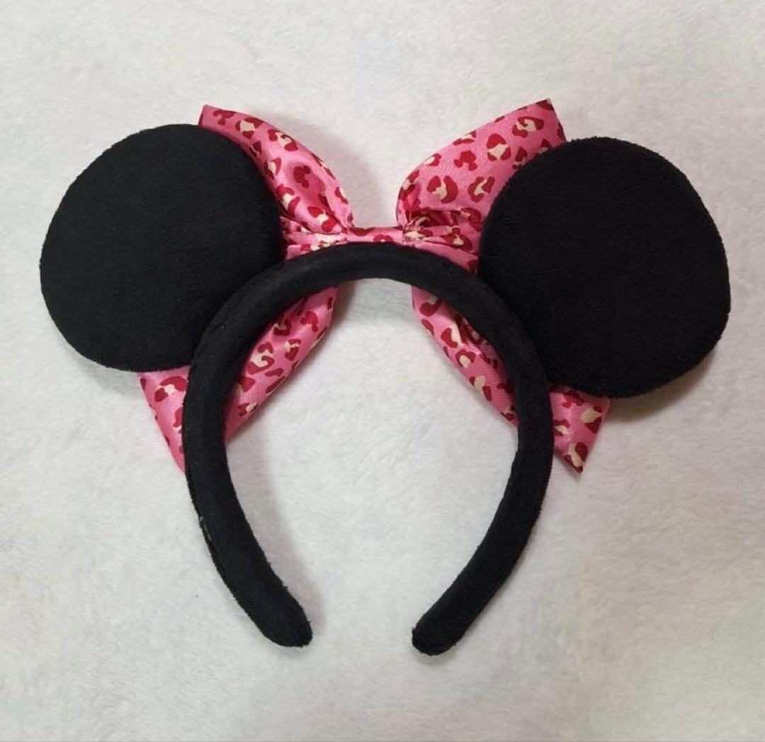 ディズニー カチューシャ ヒョウ柄 ピンク リボン - メルカリ