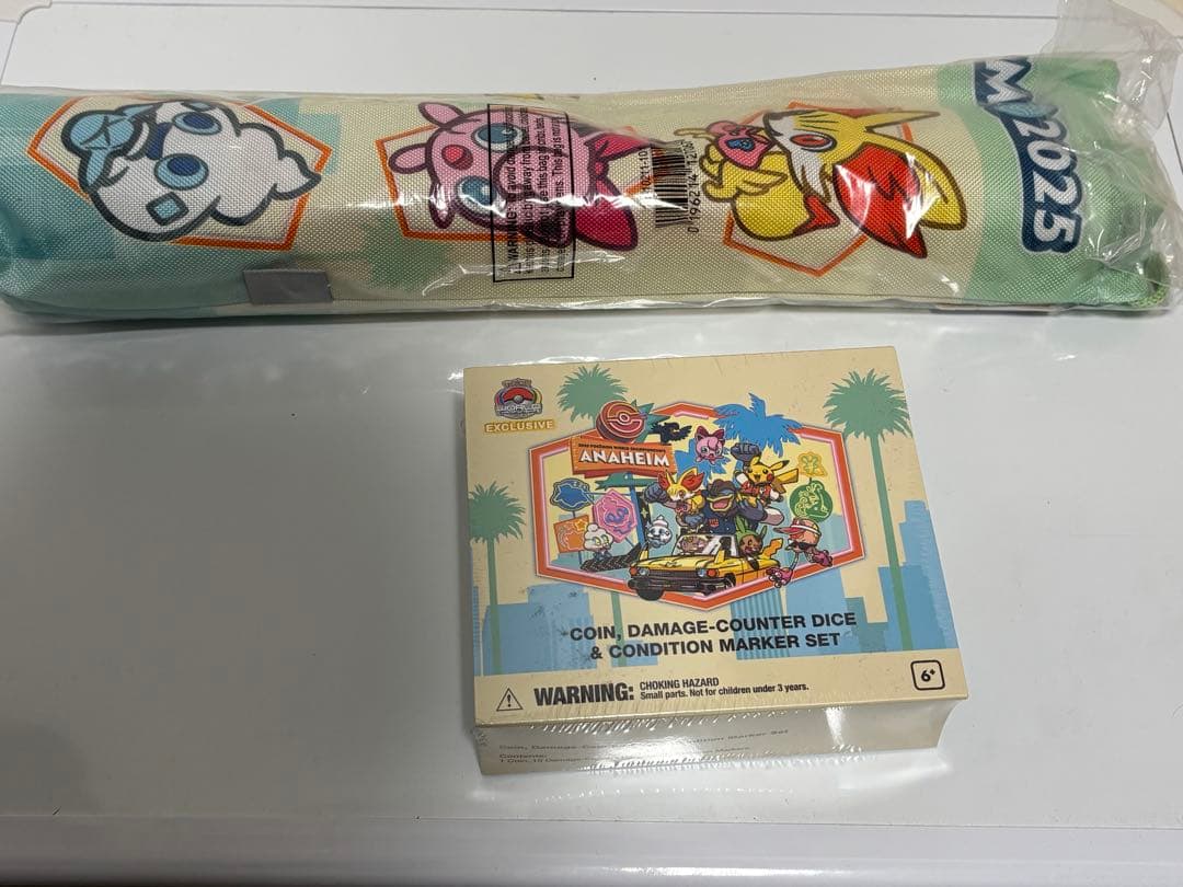 WCS2025 アナハイム プレイマット・ダメカンコインケース - メルカリ