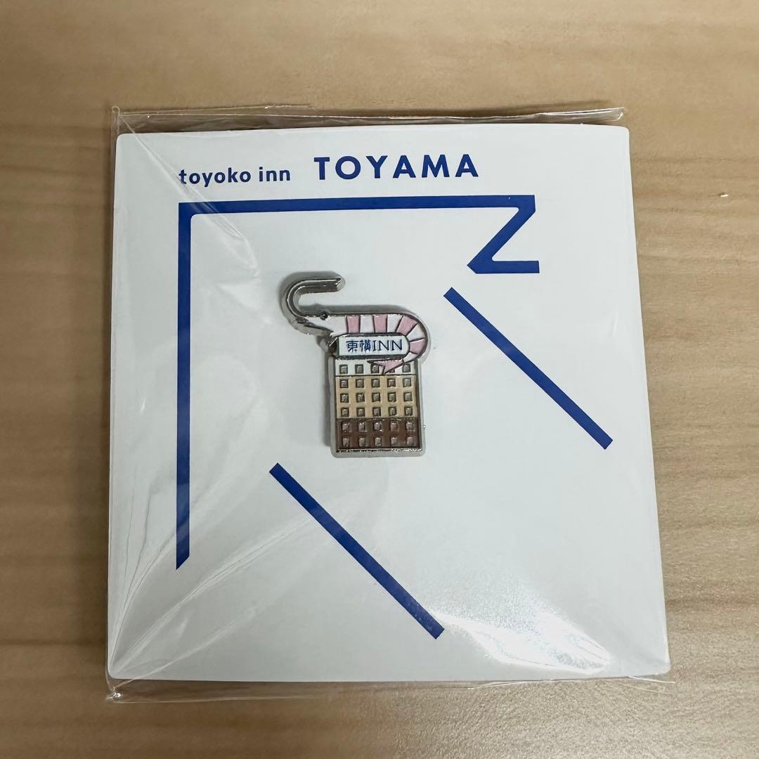 東横イン限定ピンバッジ 富山県 - メルカリ