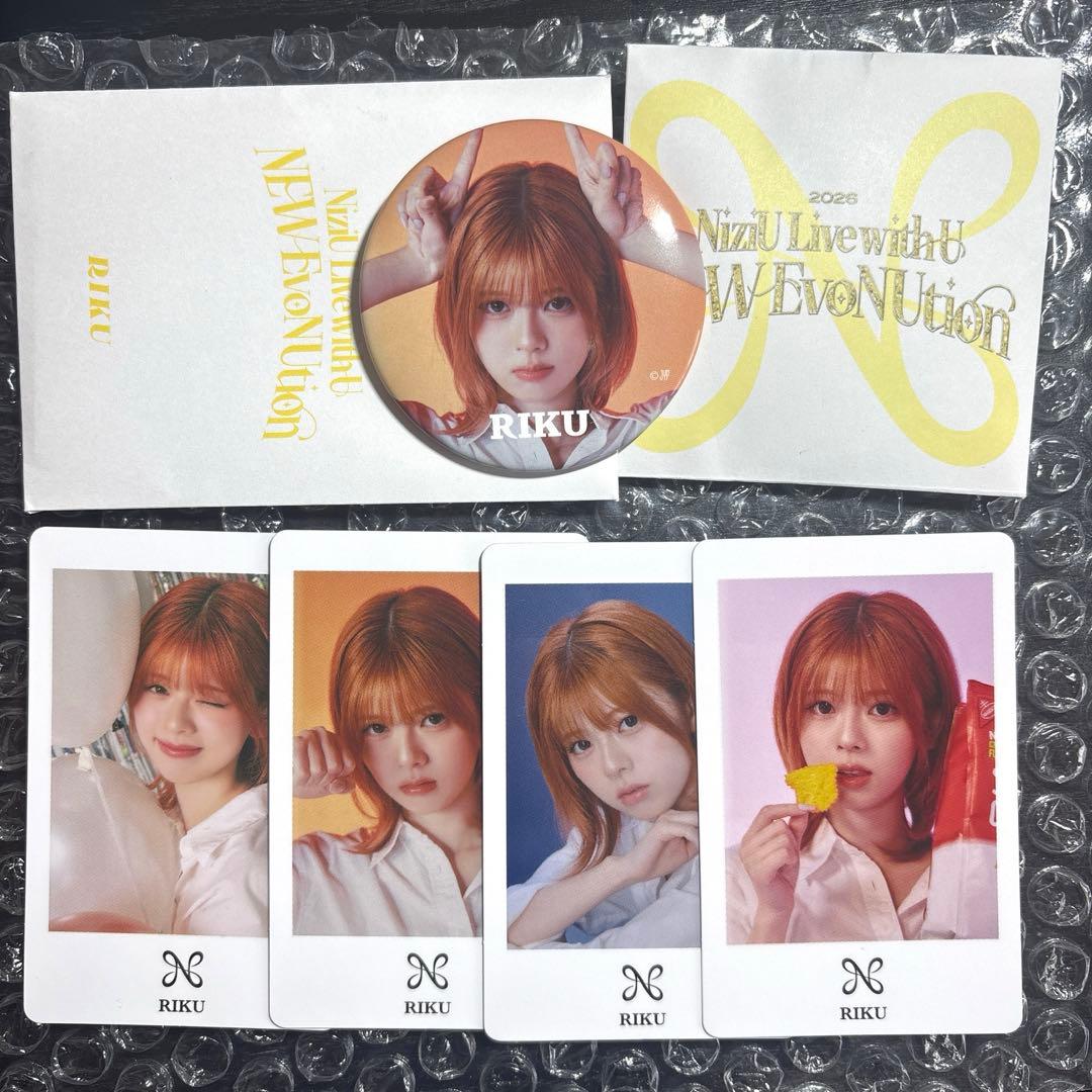 NiziU ランダム缶バッジ『NEW EvoNUtion』 リク フォトカード - メルカリ